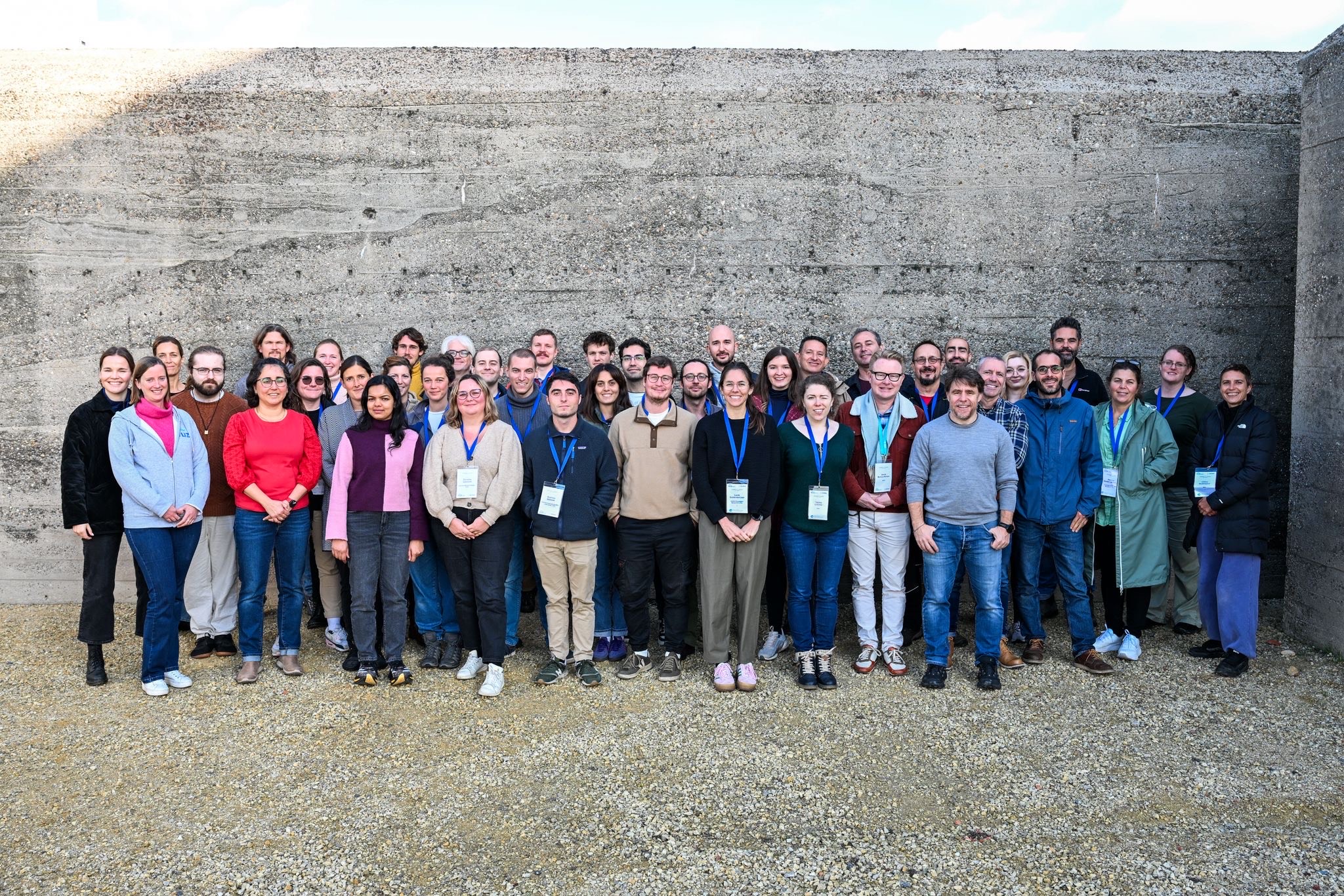 group of people smiling looking at the camera