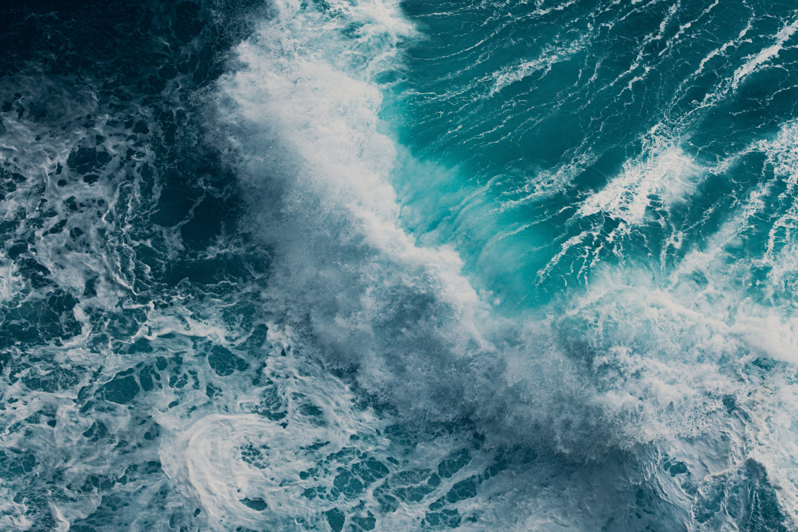 waves crashing onto shore